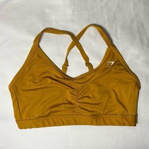 Gymshark | Ruched Sports Bra in Turmeric Yellow